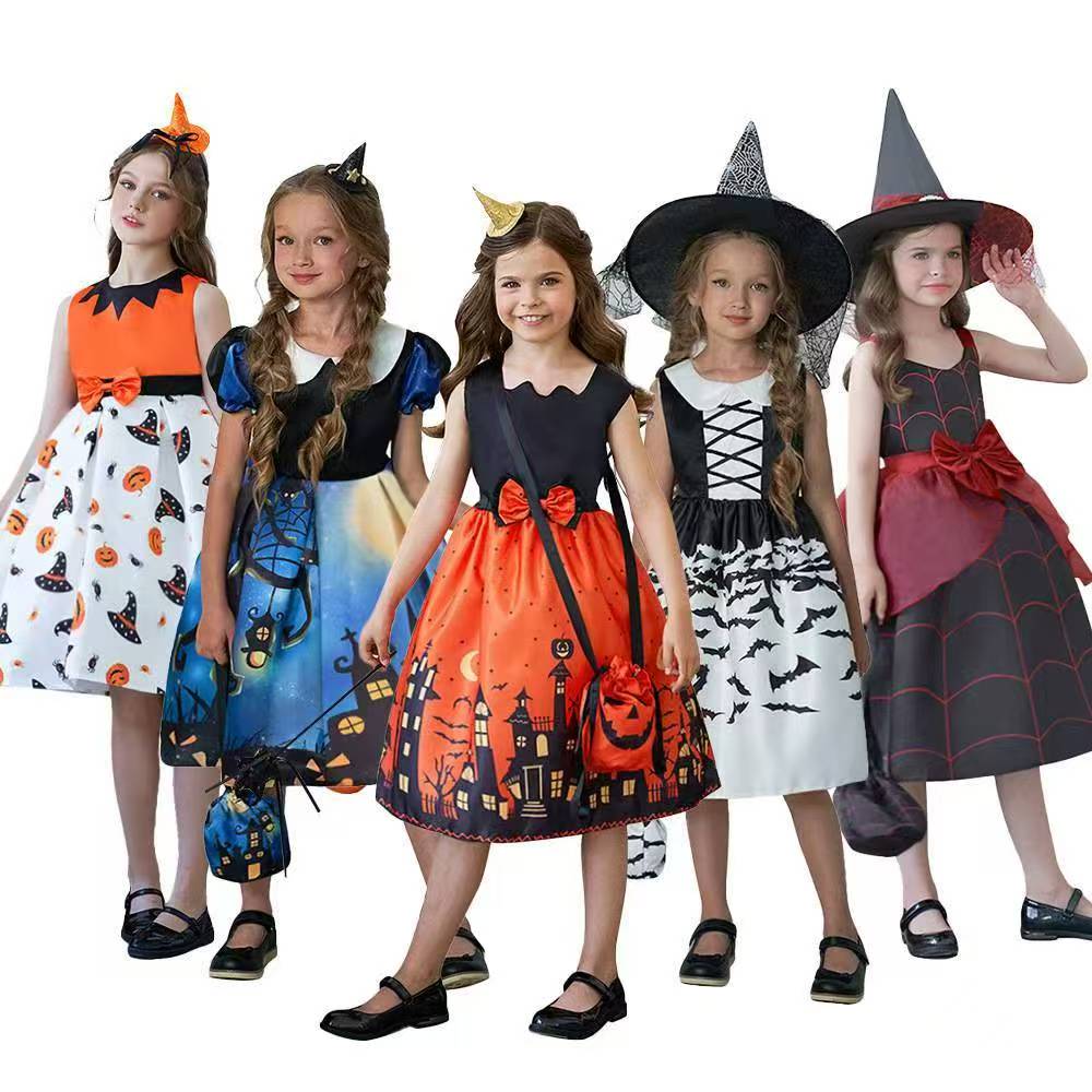 Girls in assorted Halloween dresses